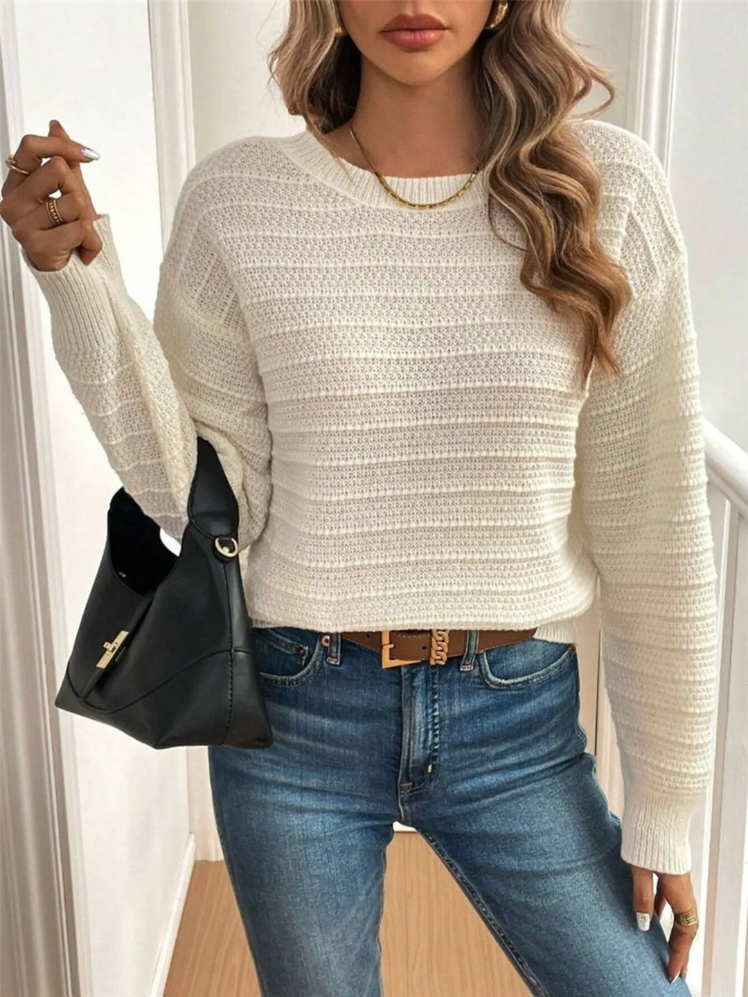 Bow detail open v back textured in beige, styled on model