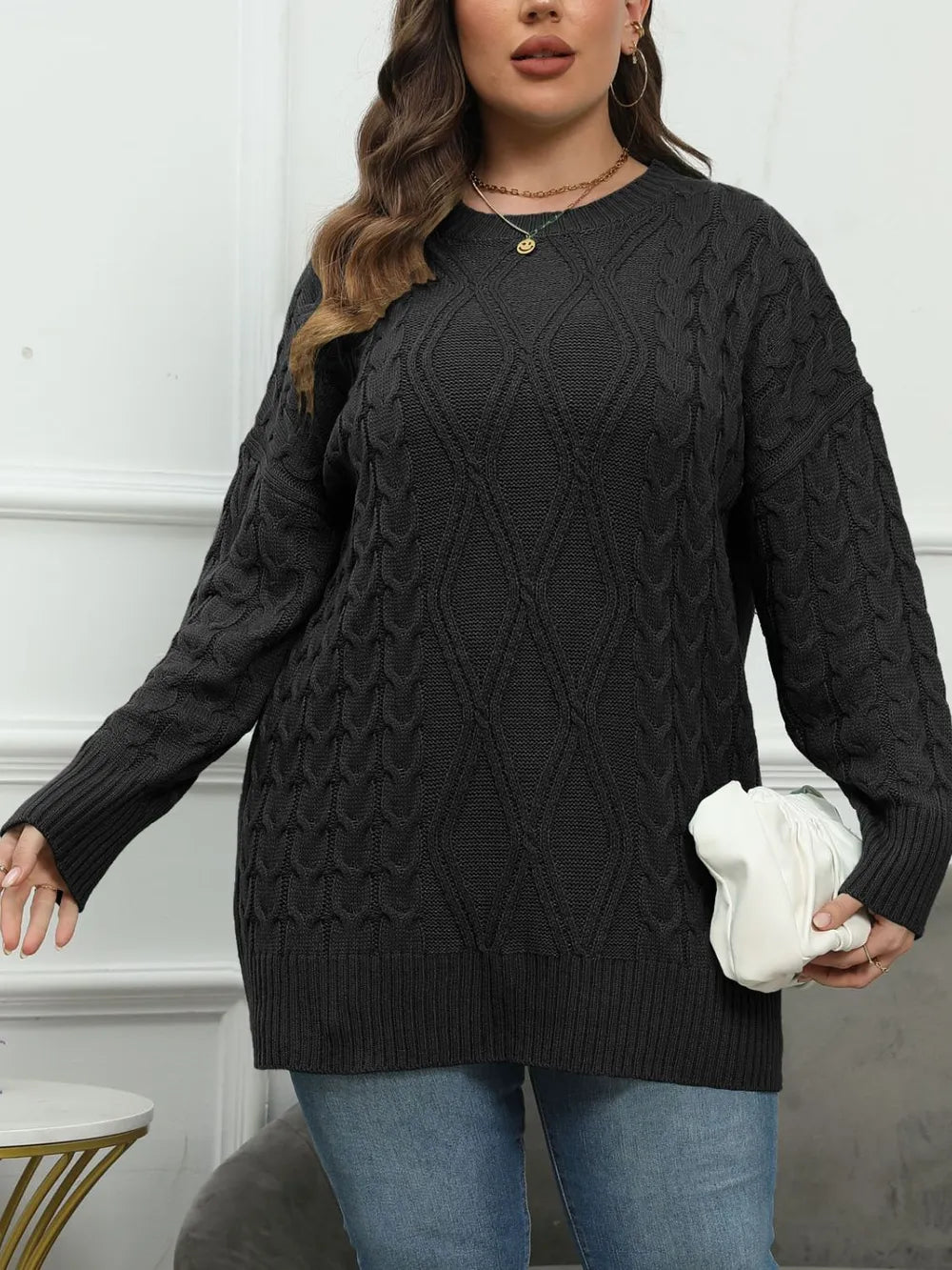 Cable longline crew neck plus size in black, front view