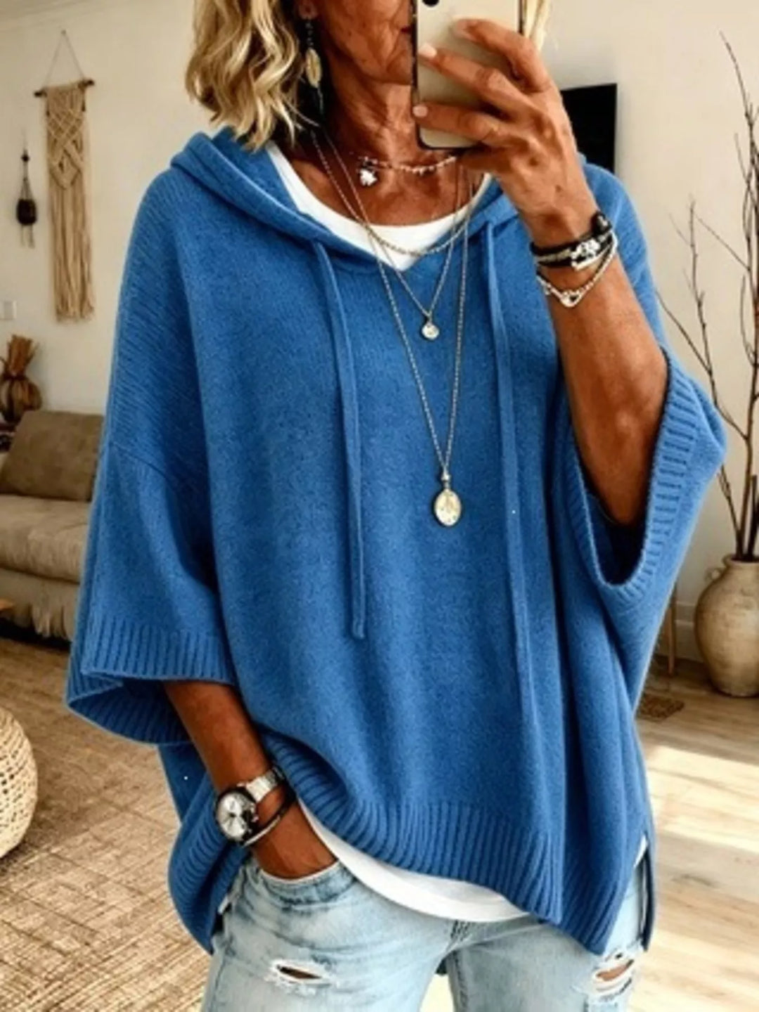 Women's knit sweater in blue, hooded batwing elbow-length sleeves