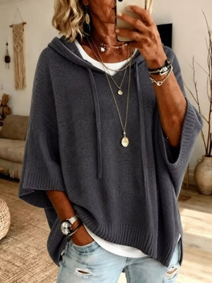 Hooded batwing elbow-length sleeves in gray, front view