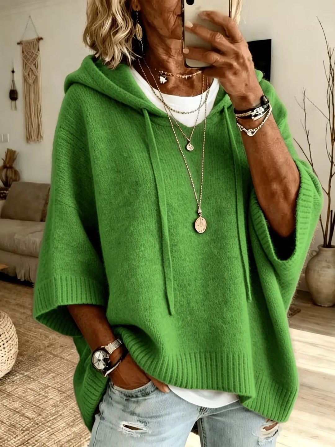 Hooded batwing elbow-length sleeves in green, front view