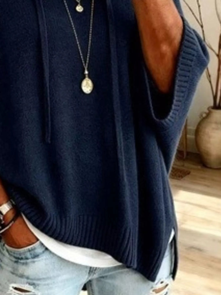 Hooded batwing elbow-length sleeves in navy, close-up detail