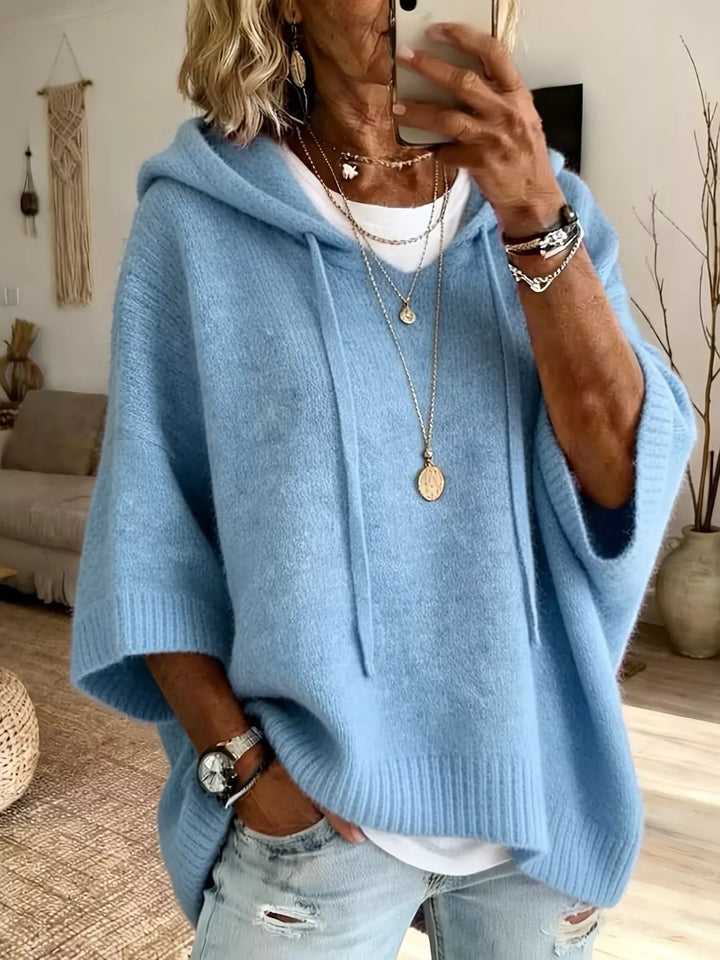 Hooded batwing elbow-length sleeves in sky blue, front view