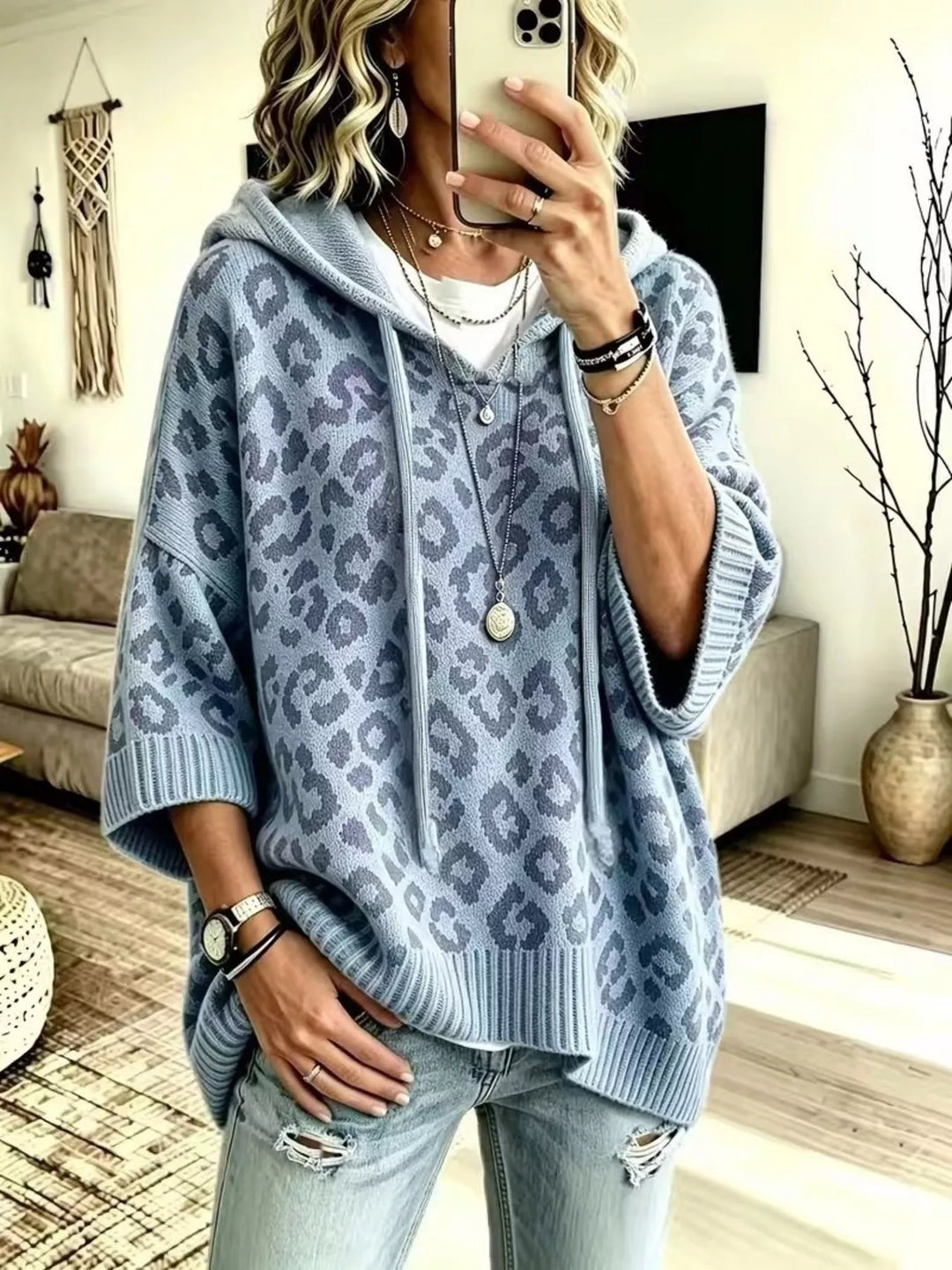 Hooded leopard print poncho style in dusty blue, front view