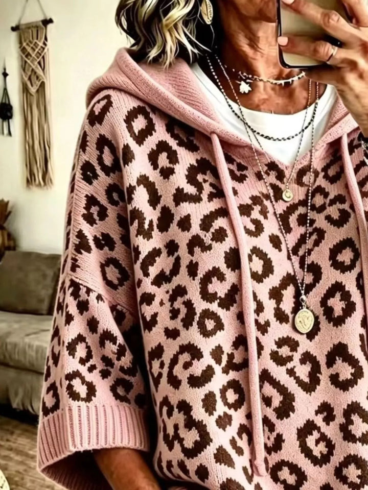Hooded leopard print poncho style in pink, close-up detail