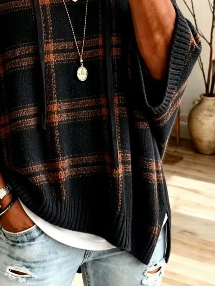 Plaid hooded poncho style drawstring in black, close-up detail