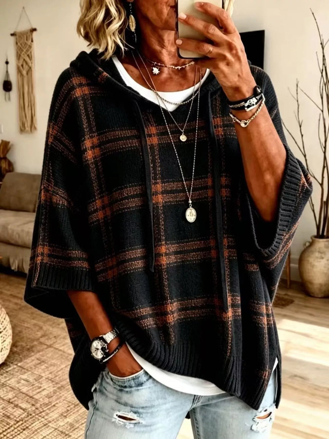 Plaid hooded poncho style drawstring in black, front view