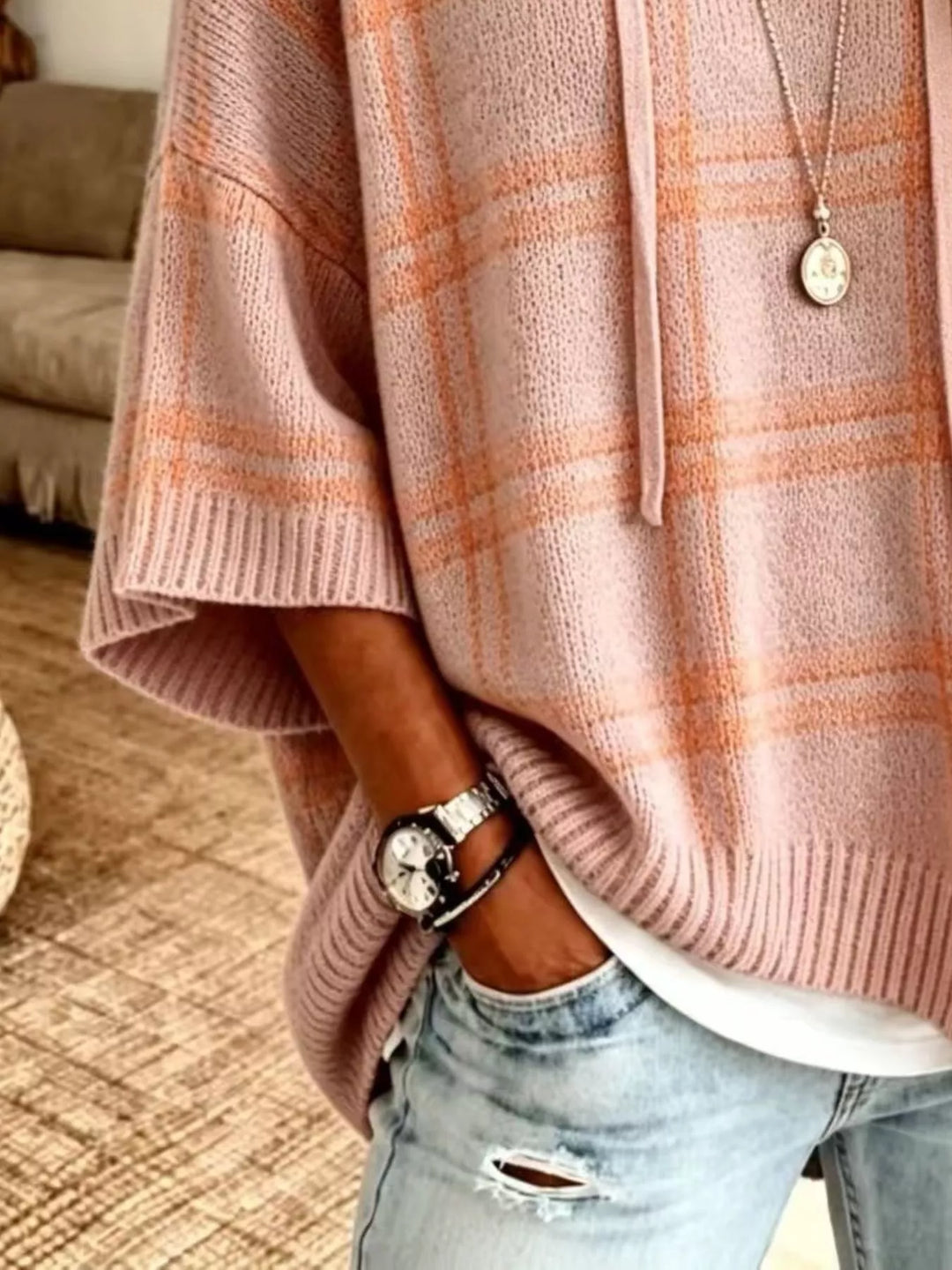Plaid hooded poncho style drawstring in coral, close-up detail