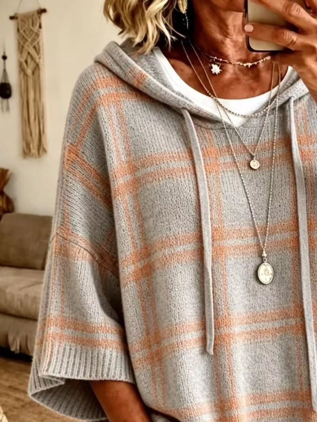 Plaid hooded poncho style drawstring in light gray, close-up detail