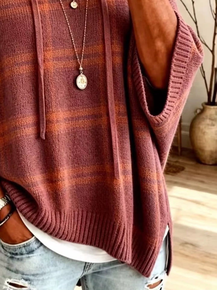 Plaid hooded poncho style drawstring in red, close-up detail
