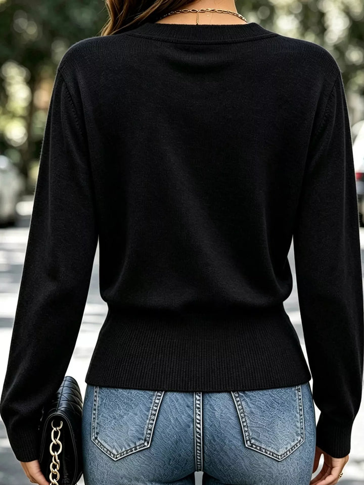 Surplice wrap front buckle belted waist in black, back view