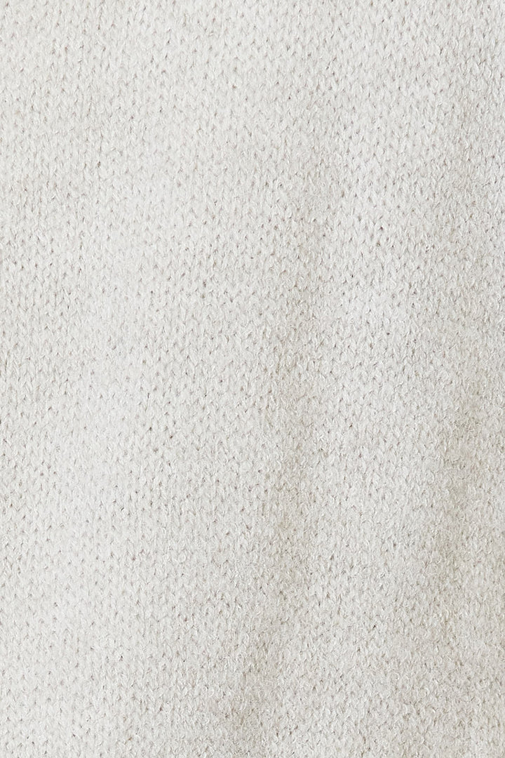 Close-up of the light gray cardigan knit texture up close
