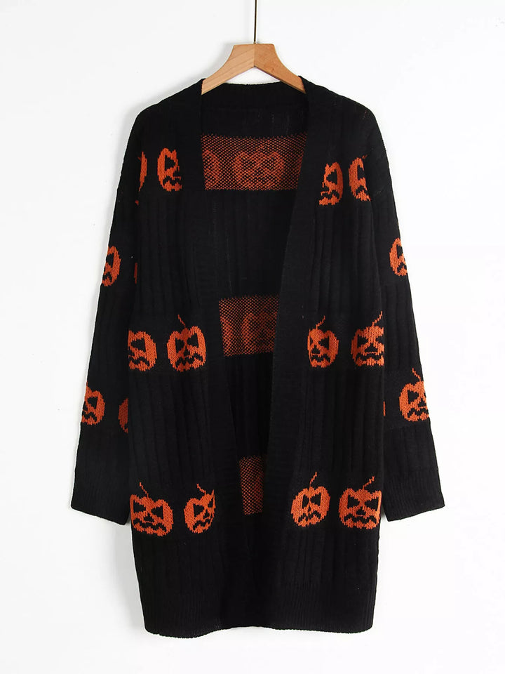 Black open front pumpkin cardigan on a hanger showing the front opening