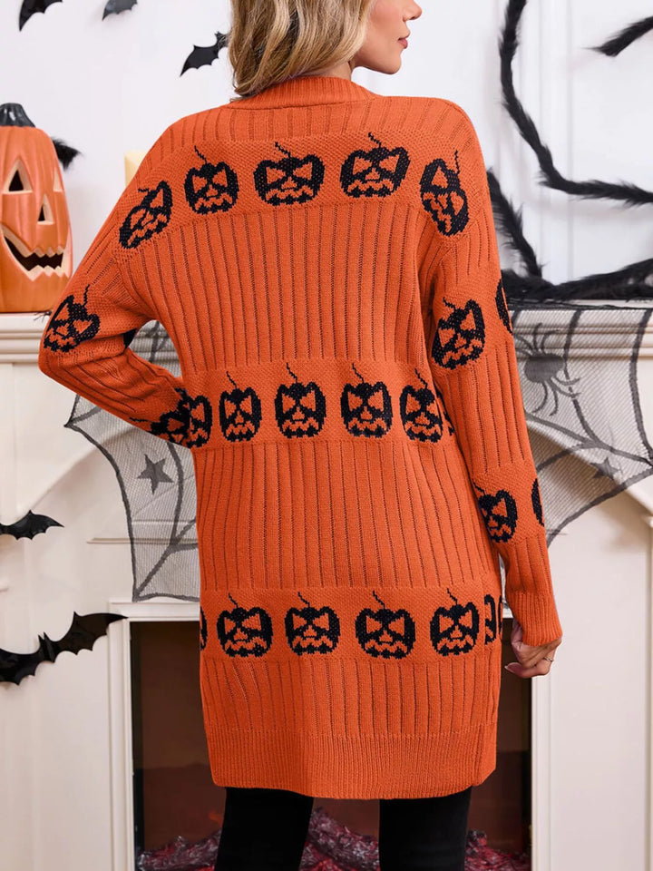 Back view of the orange ribbed cardigan with black pumpkin rows