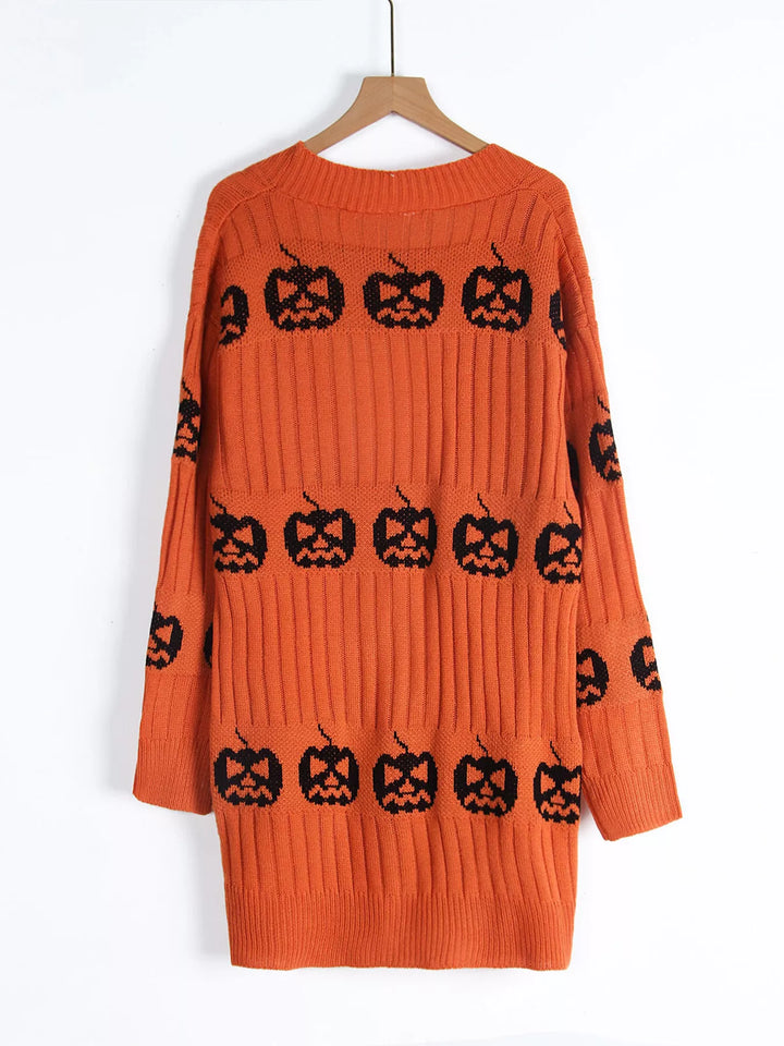 Orange pumpkin pattern long cardigan on a hanger, back view