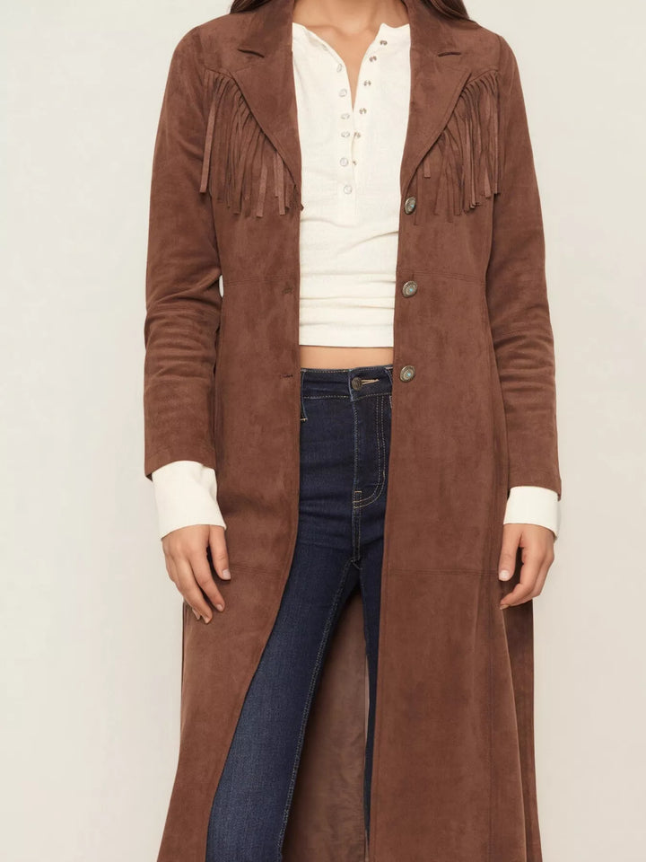 Women's cognac long coat, open front duster with fringe details, worn over a white top