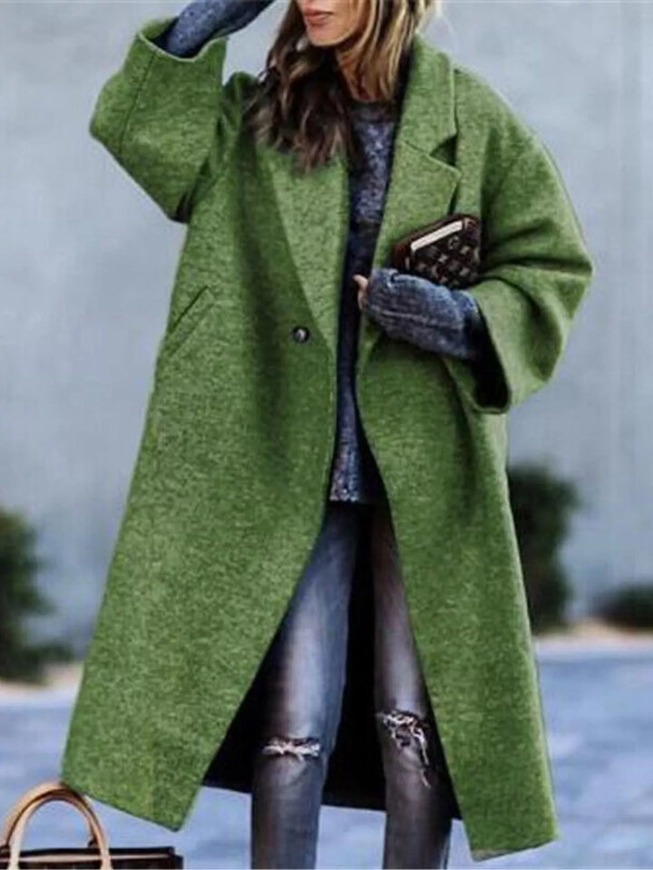 Oversized lapel one button longline in dark green, front view