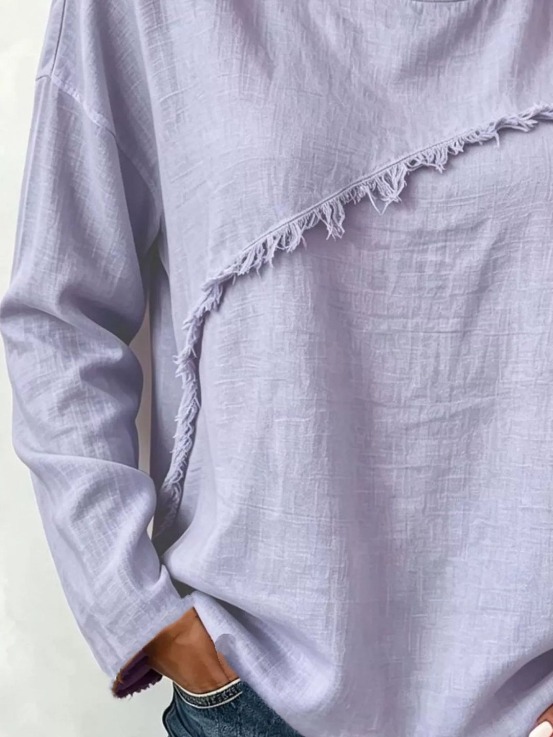 Frayed diagonal seam round neck in lavender, close-up detail