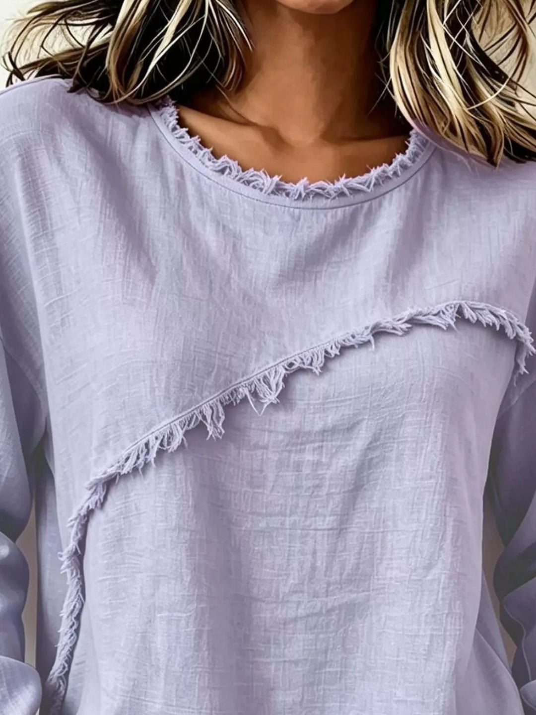 Frayed diagonal seam round neck in lavender, styled on model