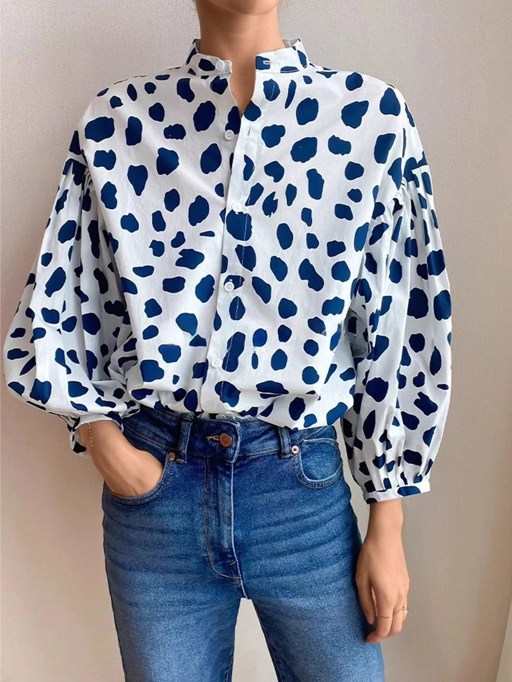 Spot print split collar button front in blue, front view