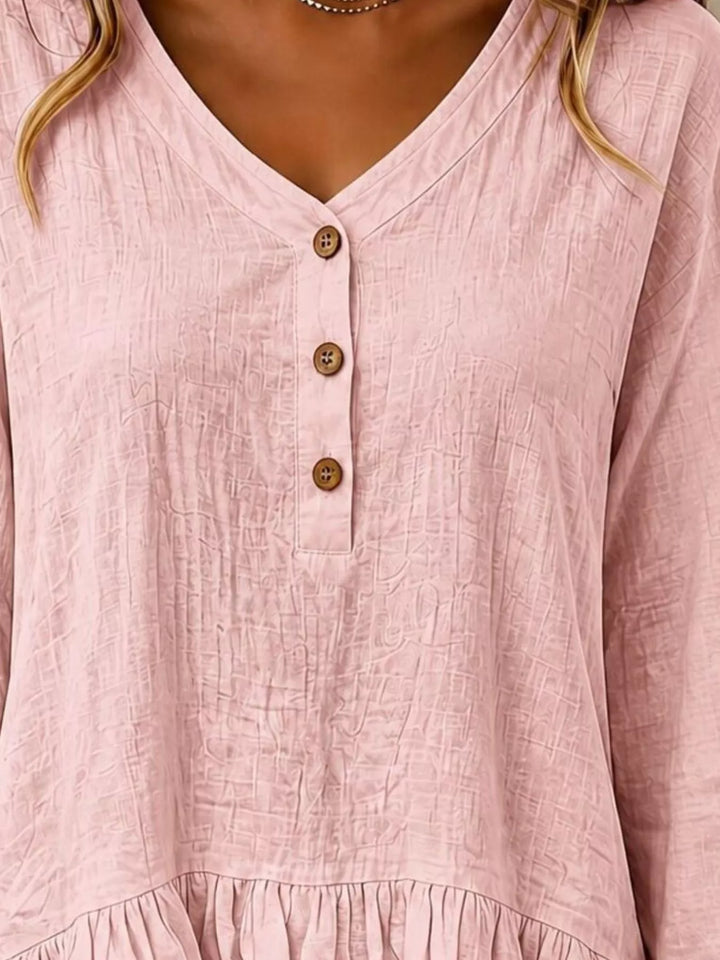 Tiered ruffle hem v-neck slub texture in dusty pink, close-up detail