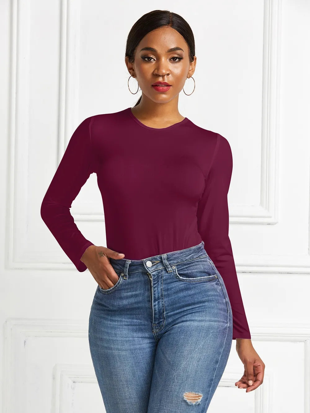 Crew neck high cut snug stretch in burgundy, styled on model 2