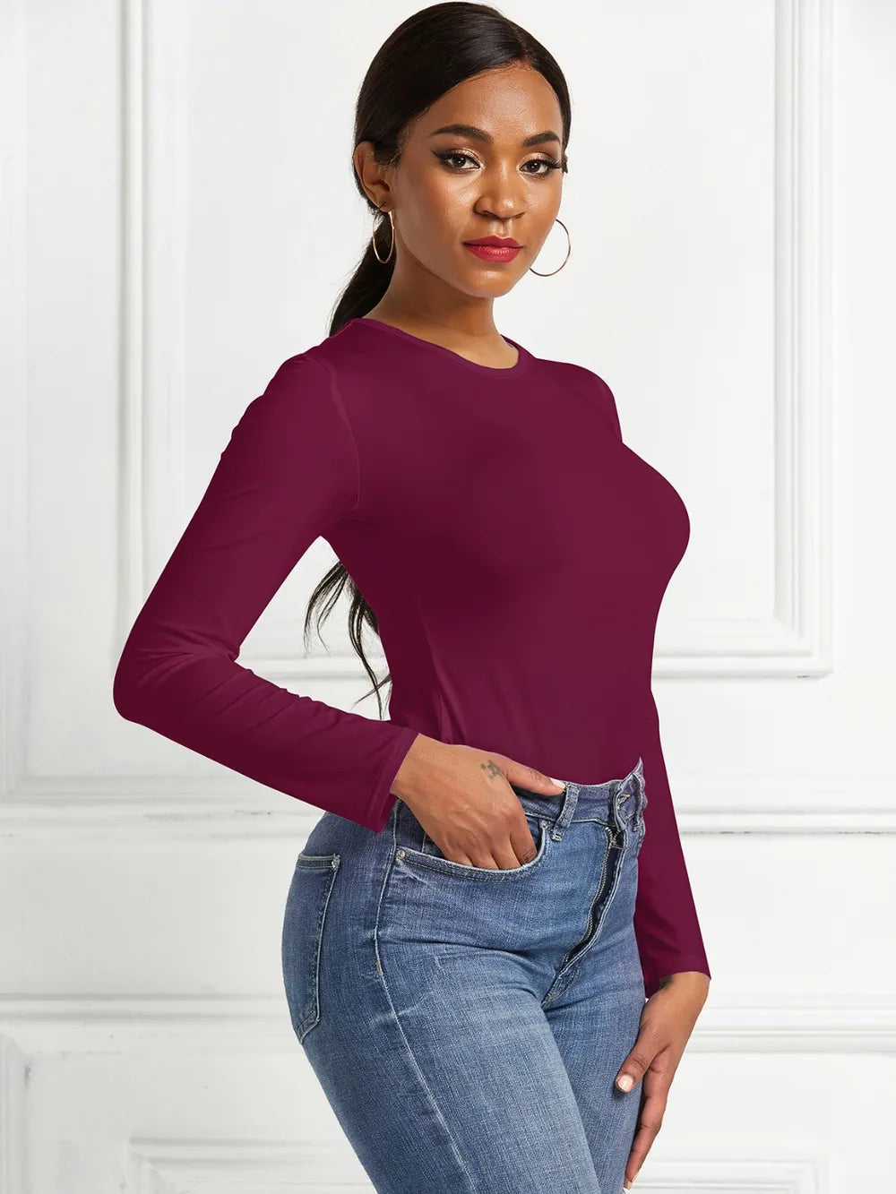 Crew neck high cut snug stretch in burgundy, styled on model 3