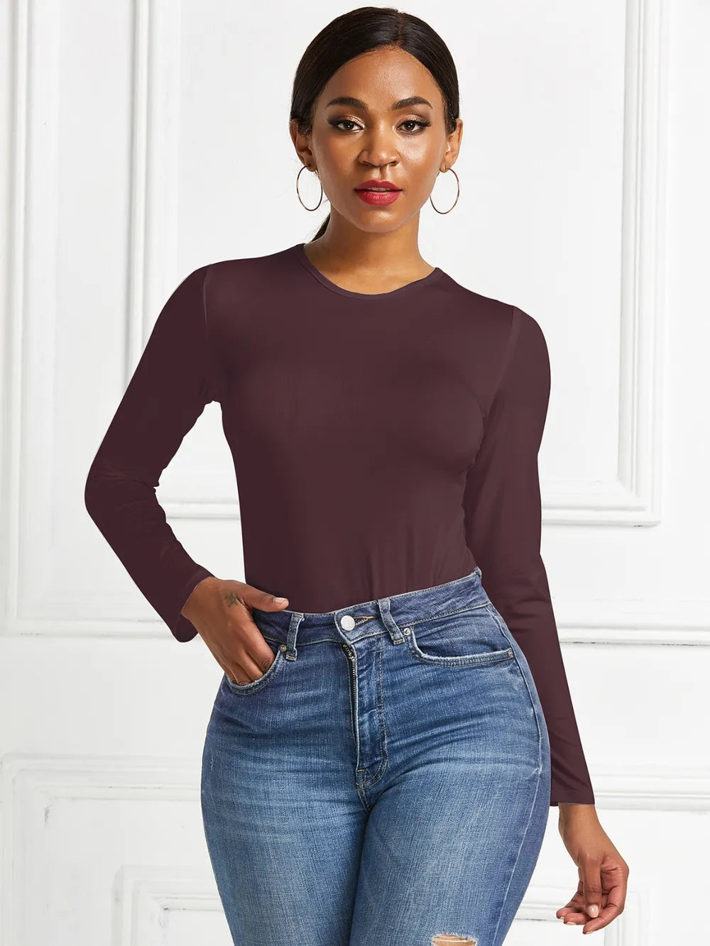 Crew neck high cut snug stretch in dark brown, styled on model 2