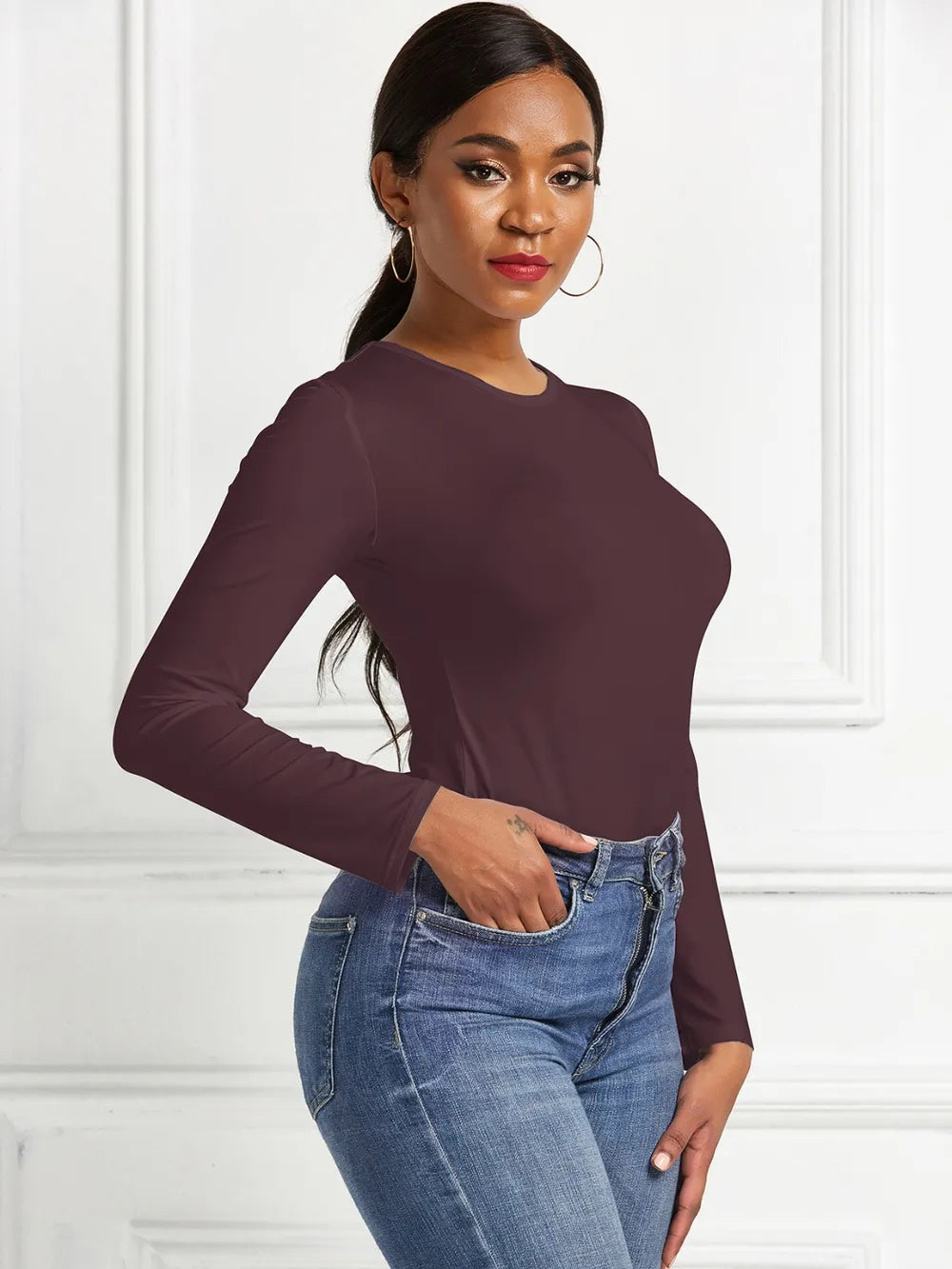 Crew neck high cut snug stretch in dark brown, styled on model 3