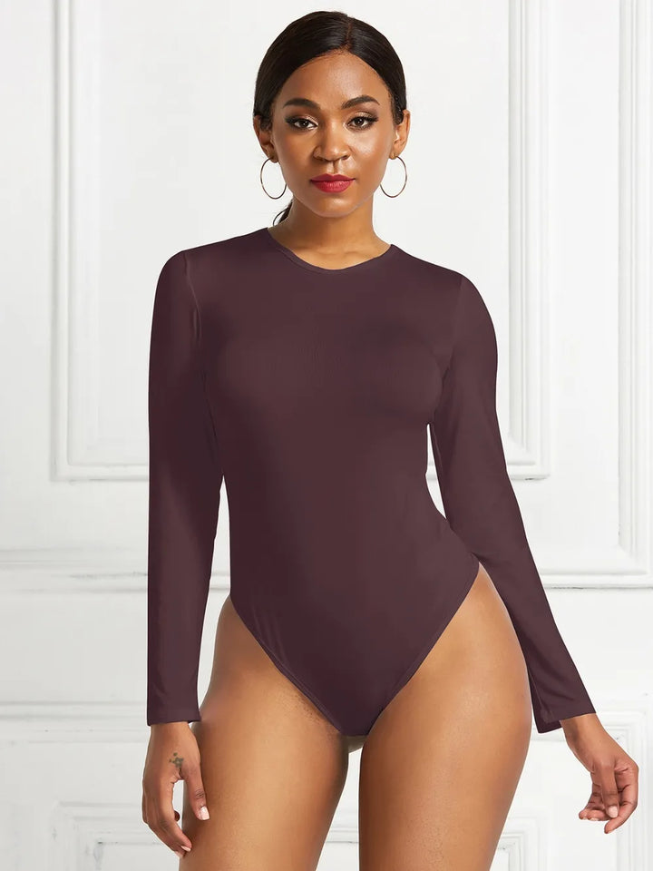 Crew neck high cut snug stretch in dark brown, styled on model
