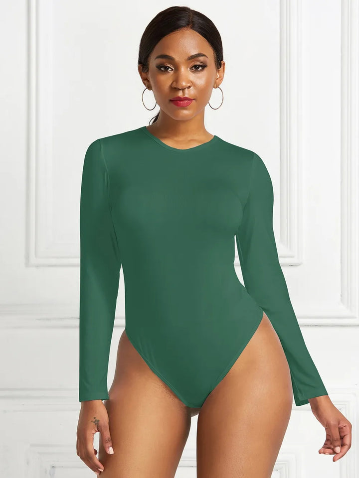 Crew neck high cut snug stretch in dark green, styled on model