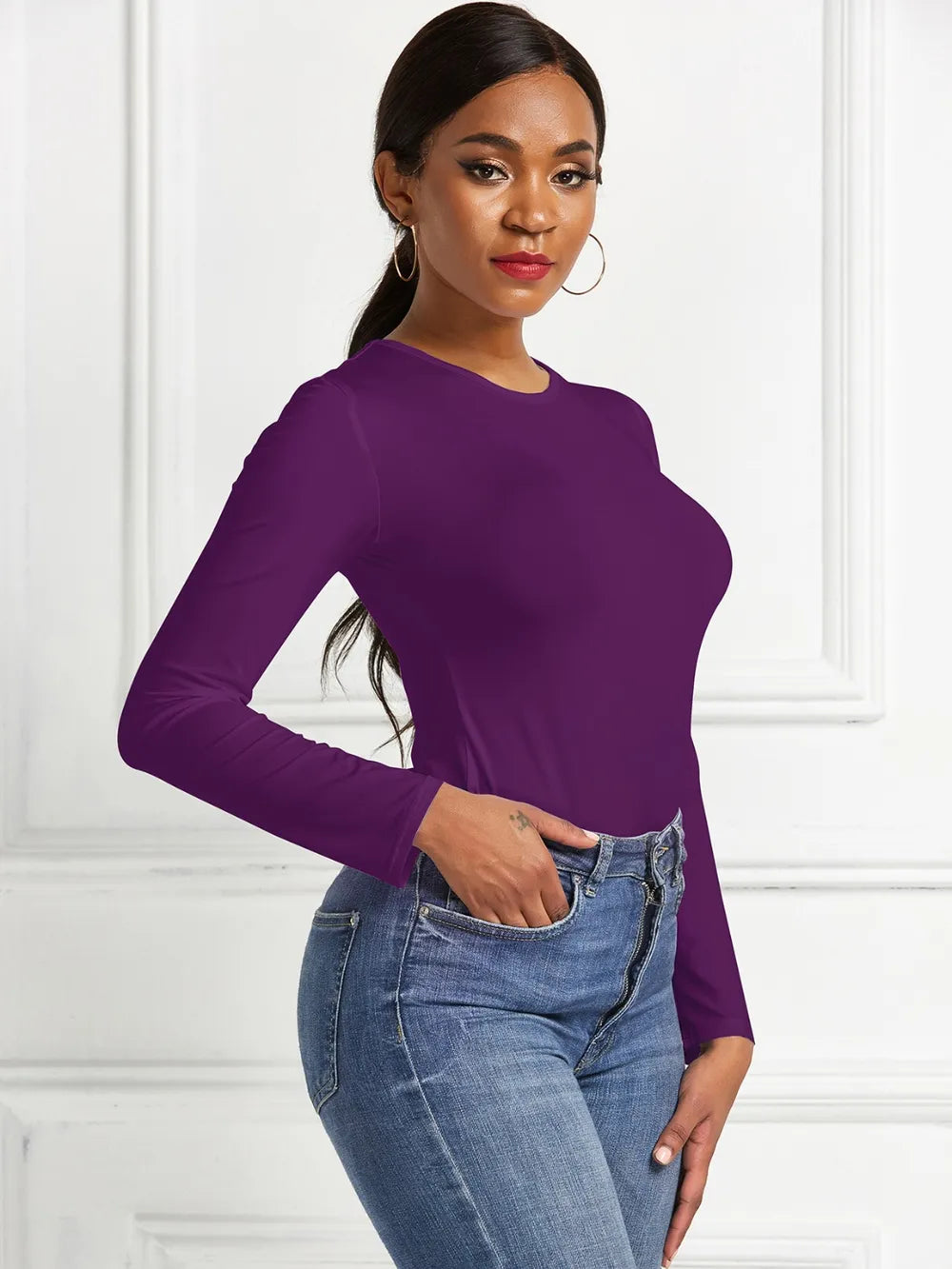 Crew neck high cut snug stretch in deep purple, styled on model 3
