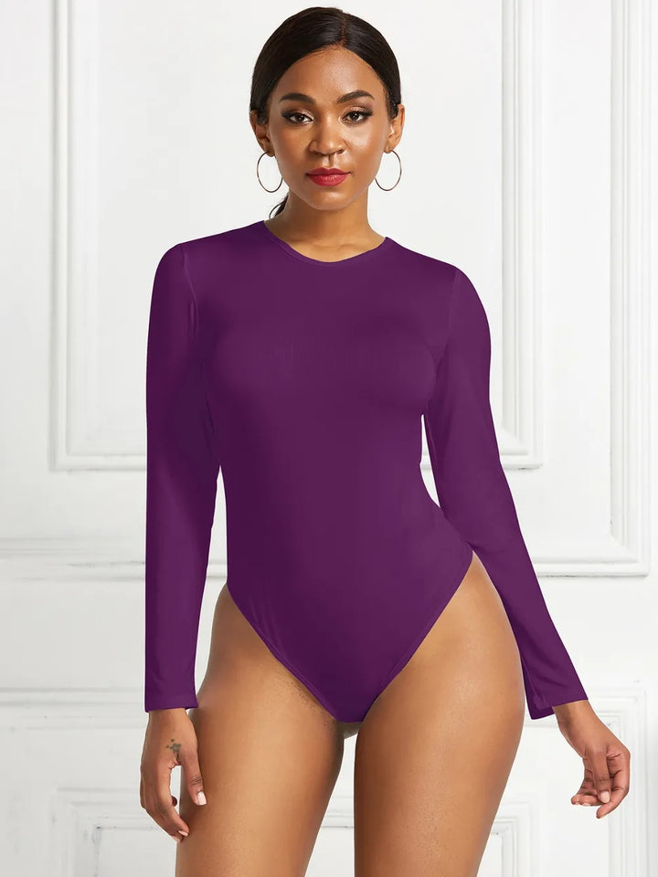 Crew neck high cut snug stretch in deep purple, styled on model