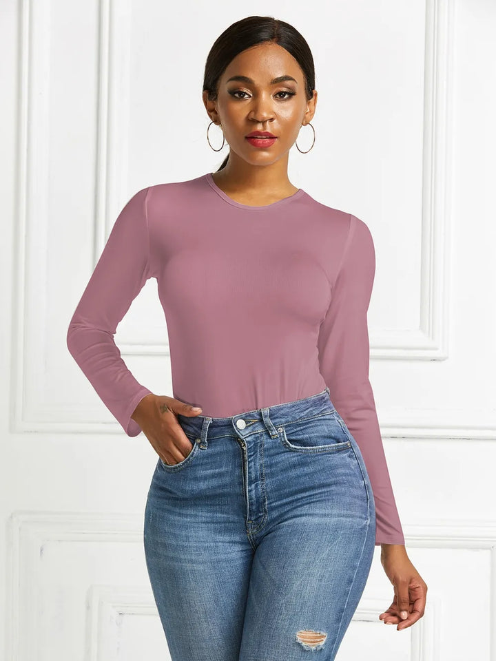 Crew neck high cut snug stretch in dusty pink, styled on model 2