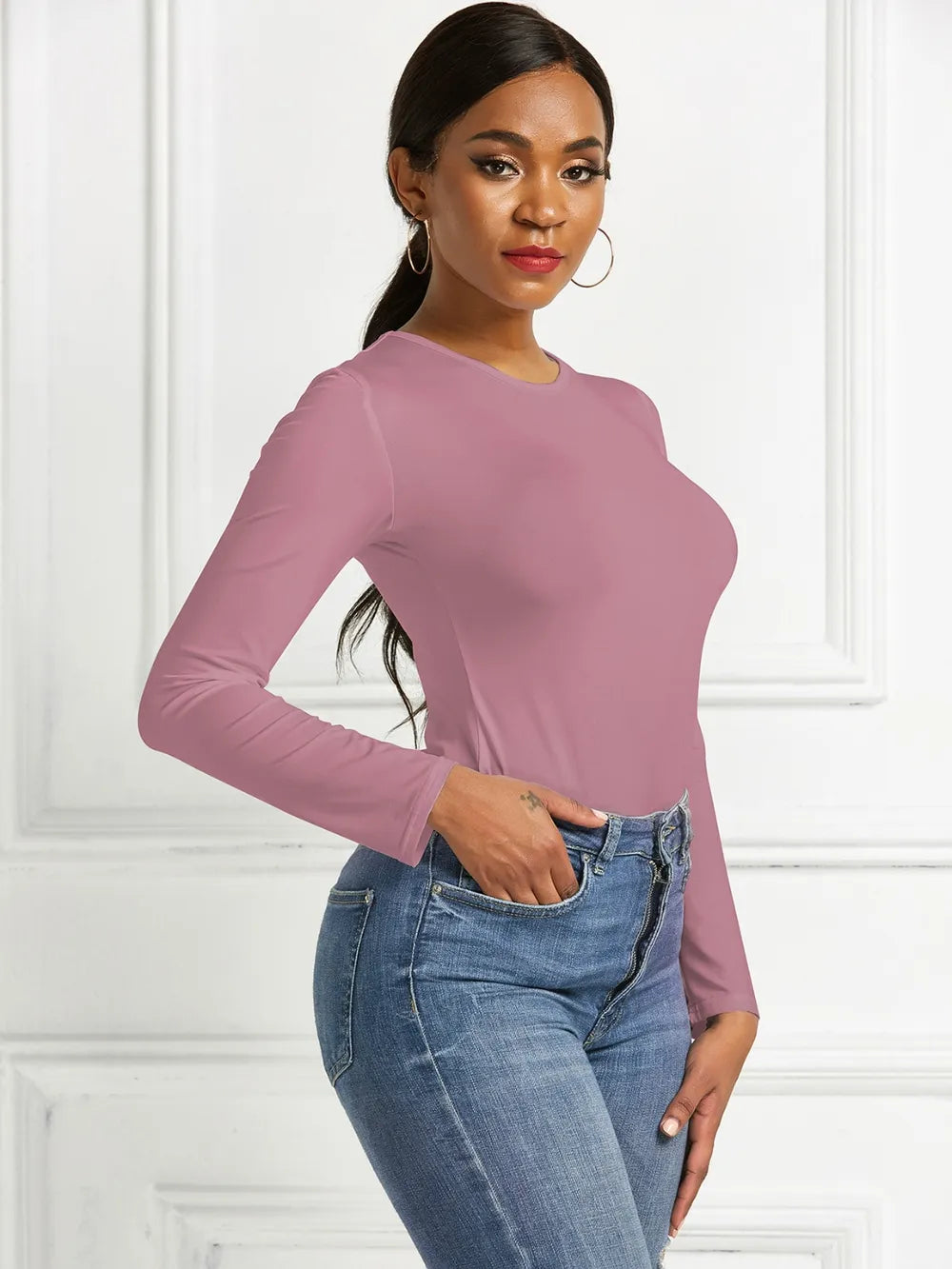 Crew neck high cut snug stretch in dusty pink, styled on model 3