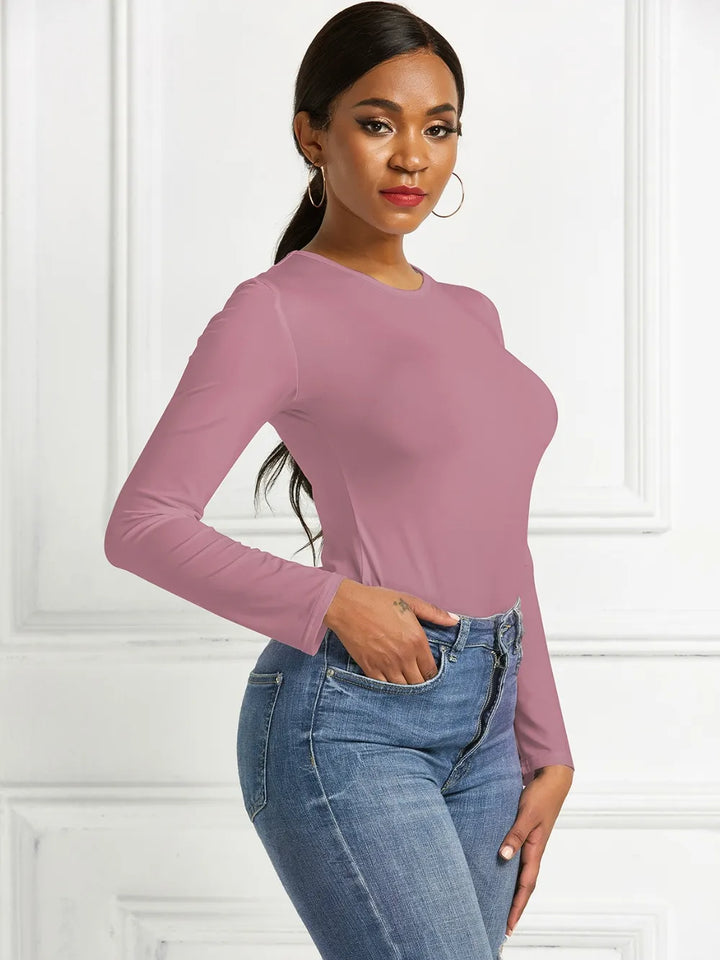 Crew neck high cut snug stretch in dusty pink, styled on model 3