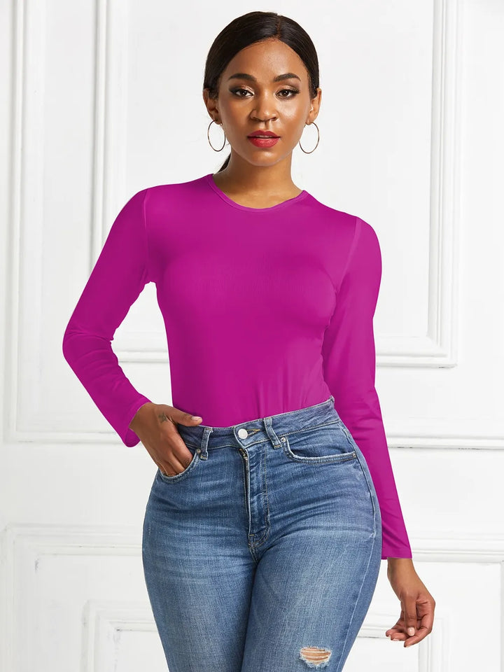 Crew neck high cut snug stretch in hot pink, styled on model 2
