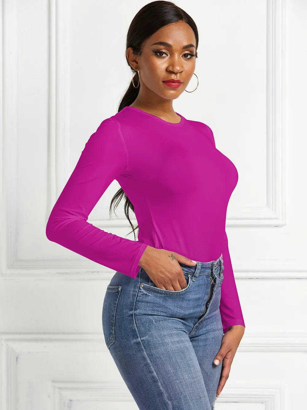 Crew neck high cut snug stretch in hot pink, styled on model 3