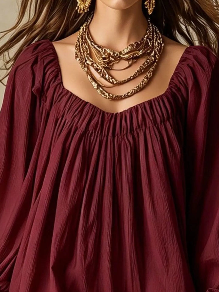 Balloon cuff gathered neckline mini in burgundy, close-up detail