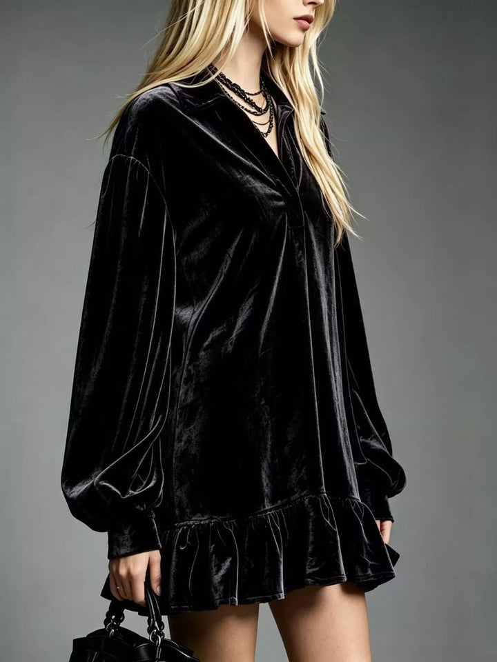 Velvet-look ruffle hem collar mini in black, styled on model