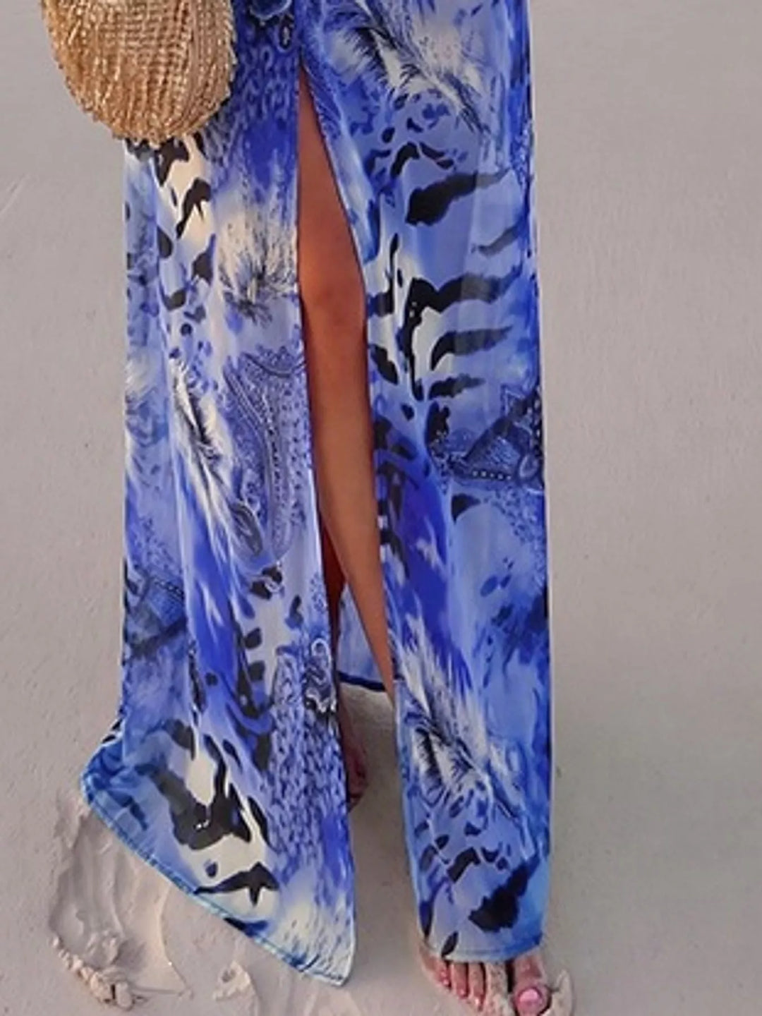 Blue maxi dress worn on a model, showing the long sleeves