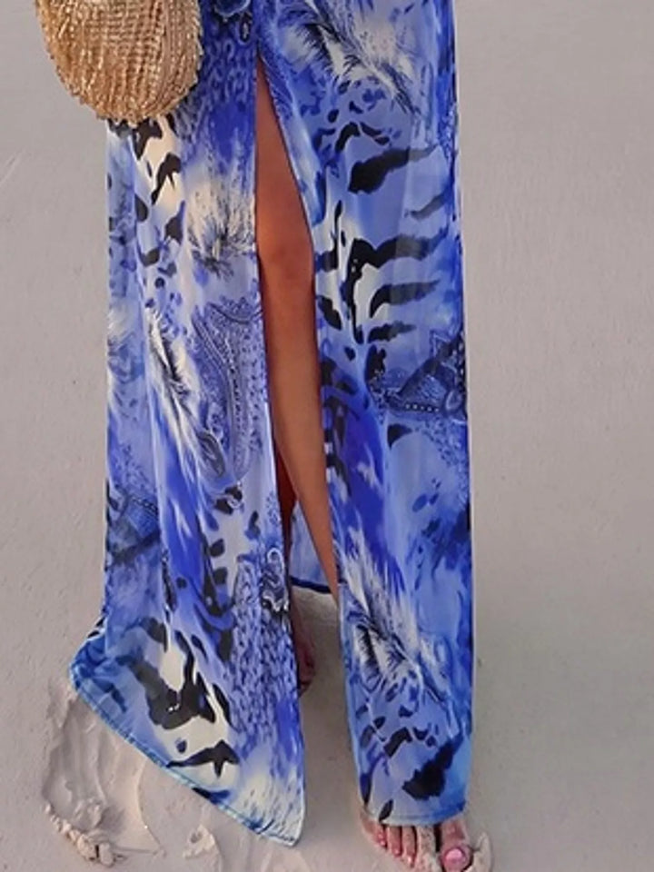 Blue maxi dress worn on a model, showing the long sleeves