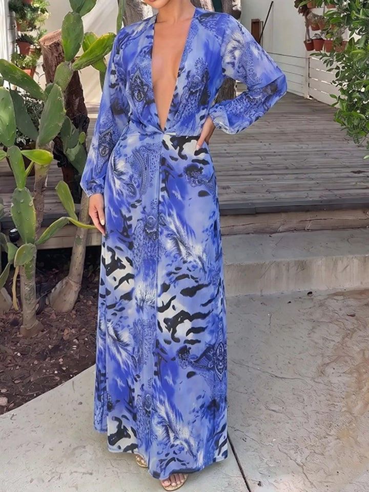 Blue maxi dress worn on a model, showing the deep V-neck