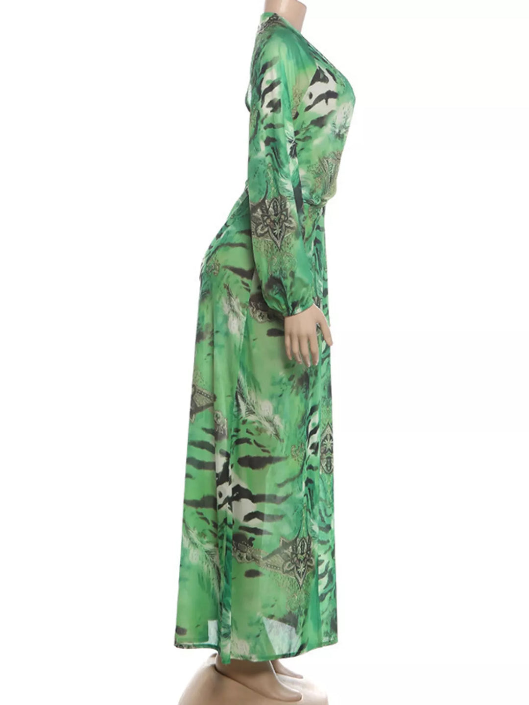 Green maxi dress shown flat with bold print