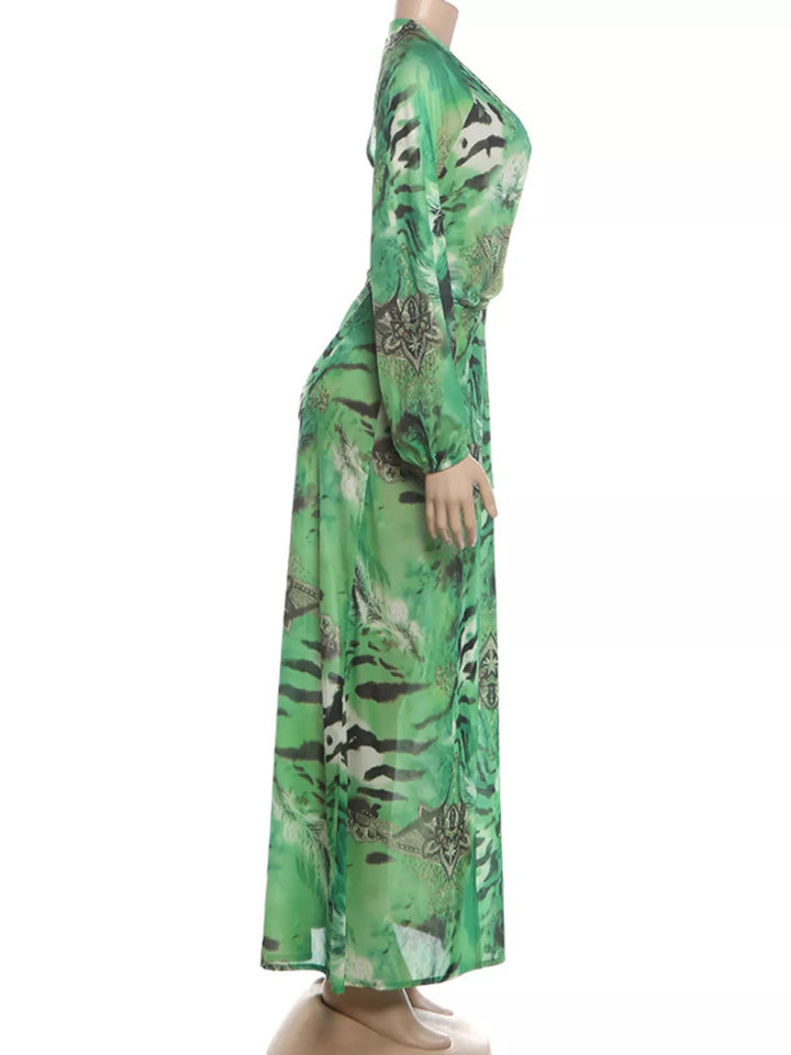 Green maxi dress shown flat with bold print