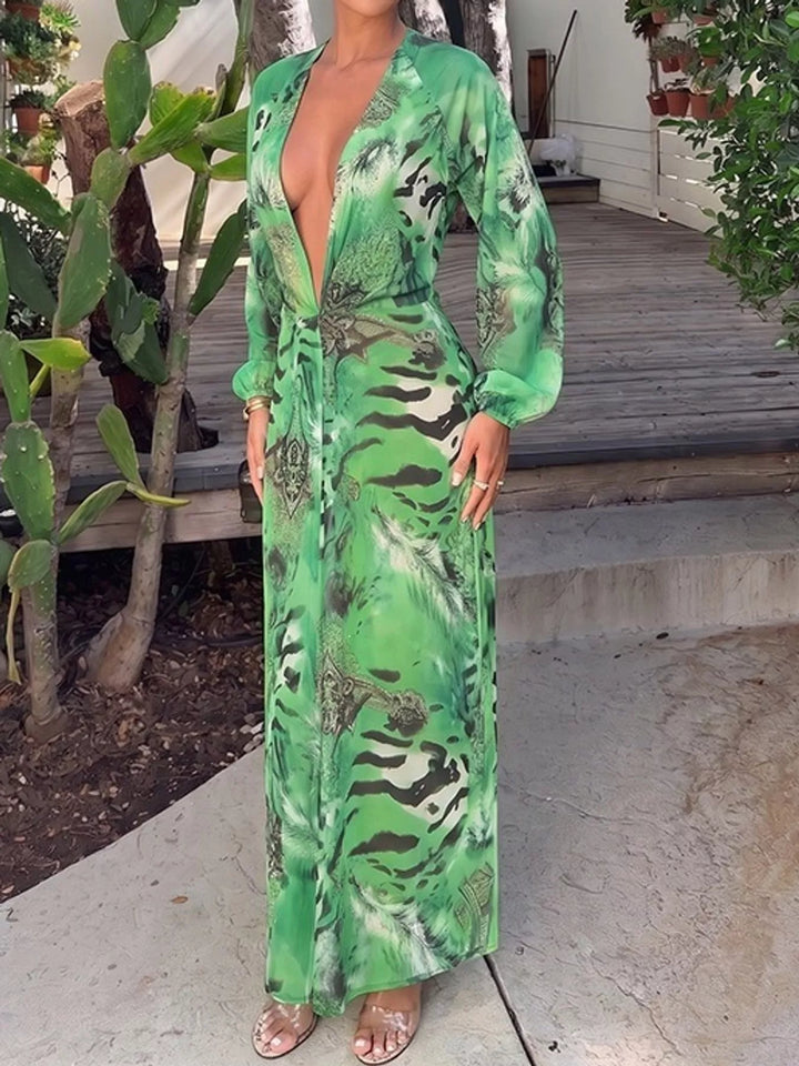 Green maxi dress worn on a model, showing the bold print