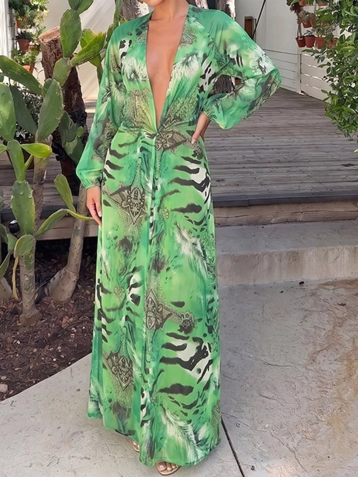 Green maxi dress worn on a model, showing the open back