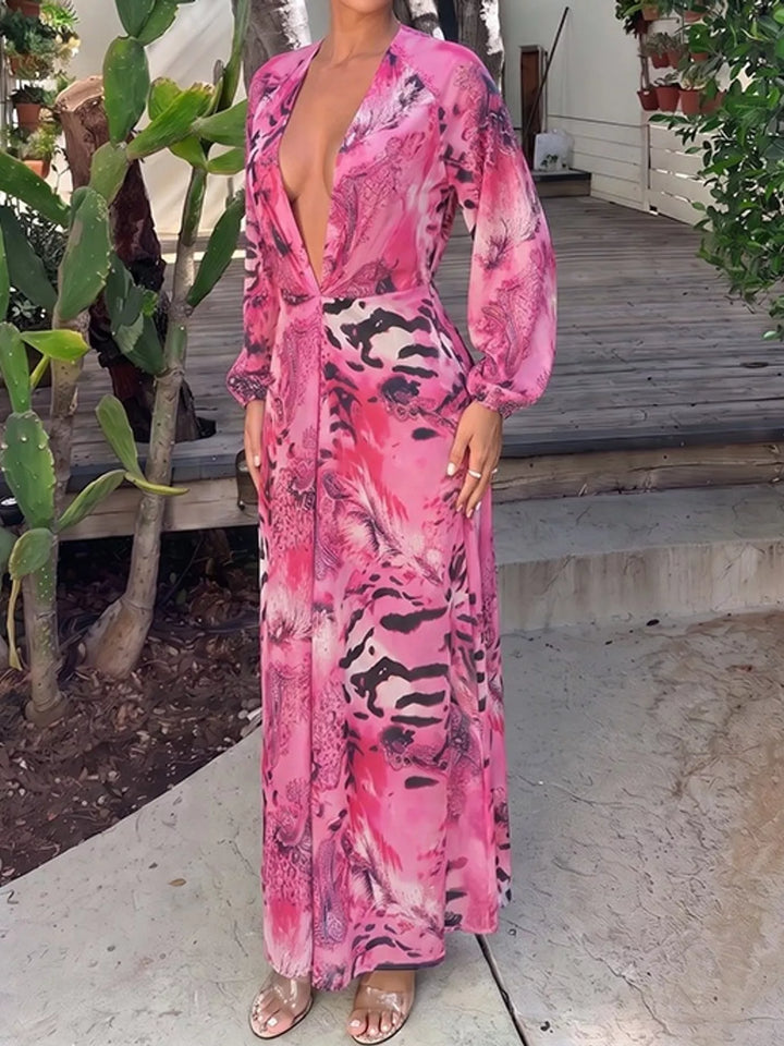 Pink maxi dress worn on a model, showing the bold print