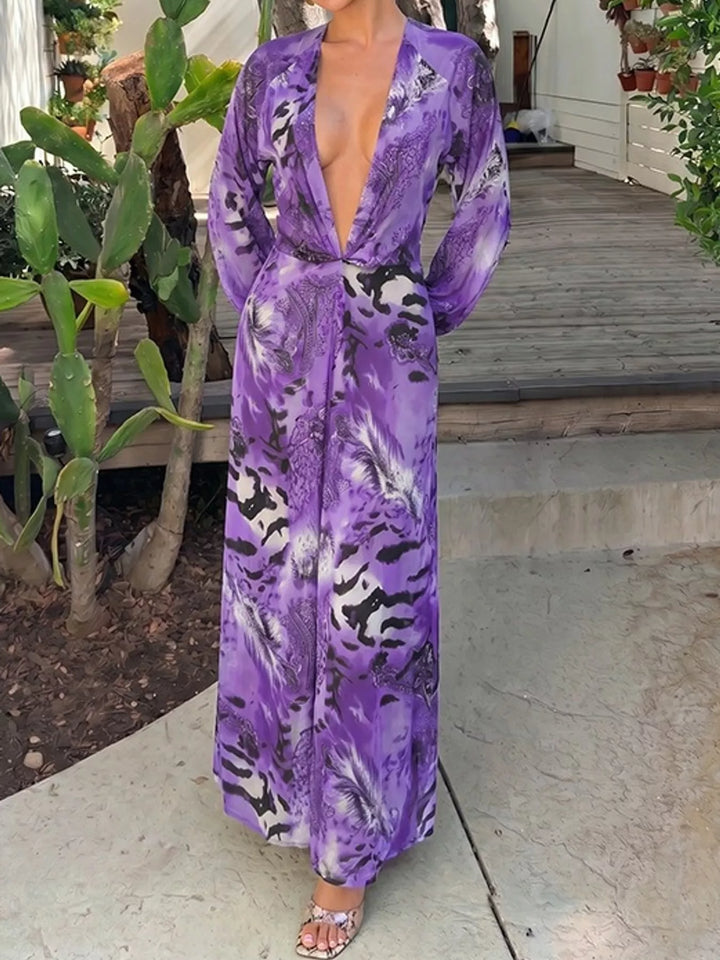 Purple maxi dress worn on a model, showing the bold print