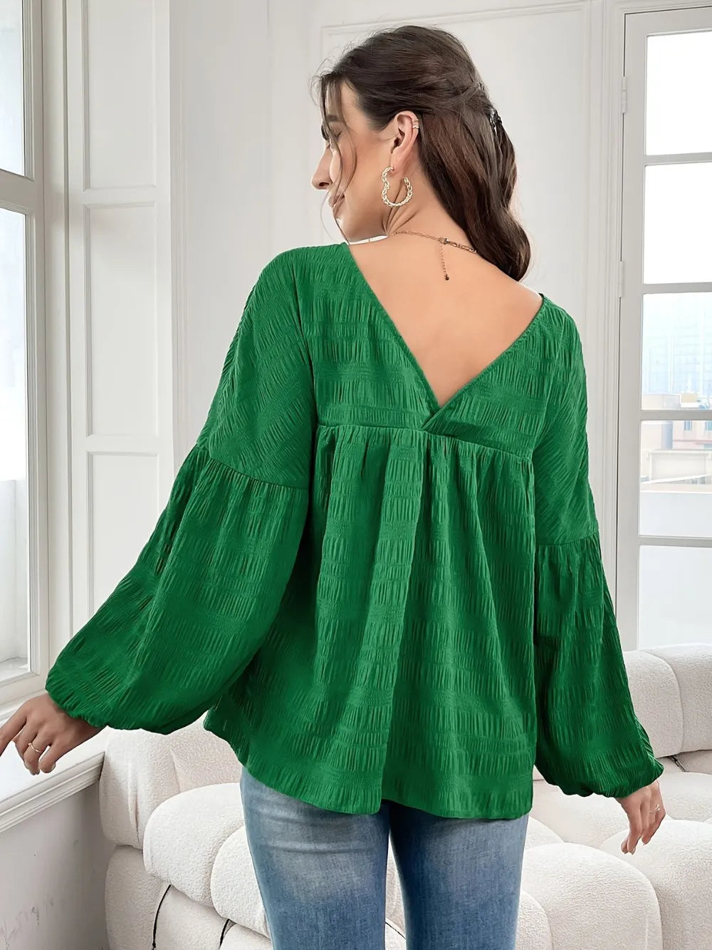 Crinkle texture gathered yoke v-neck in dark green, back view